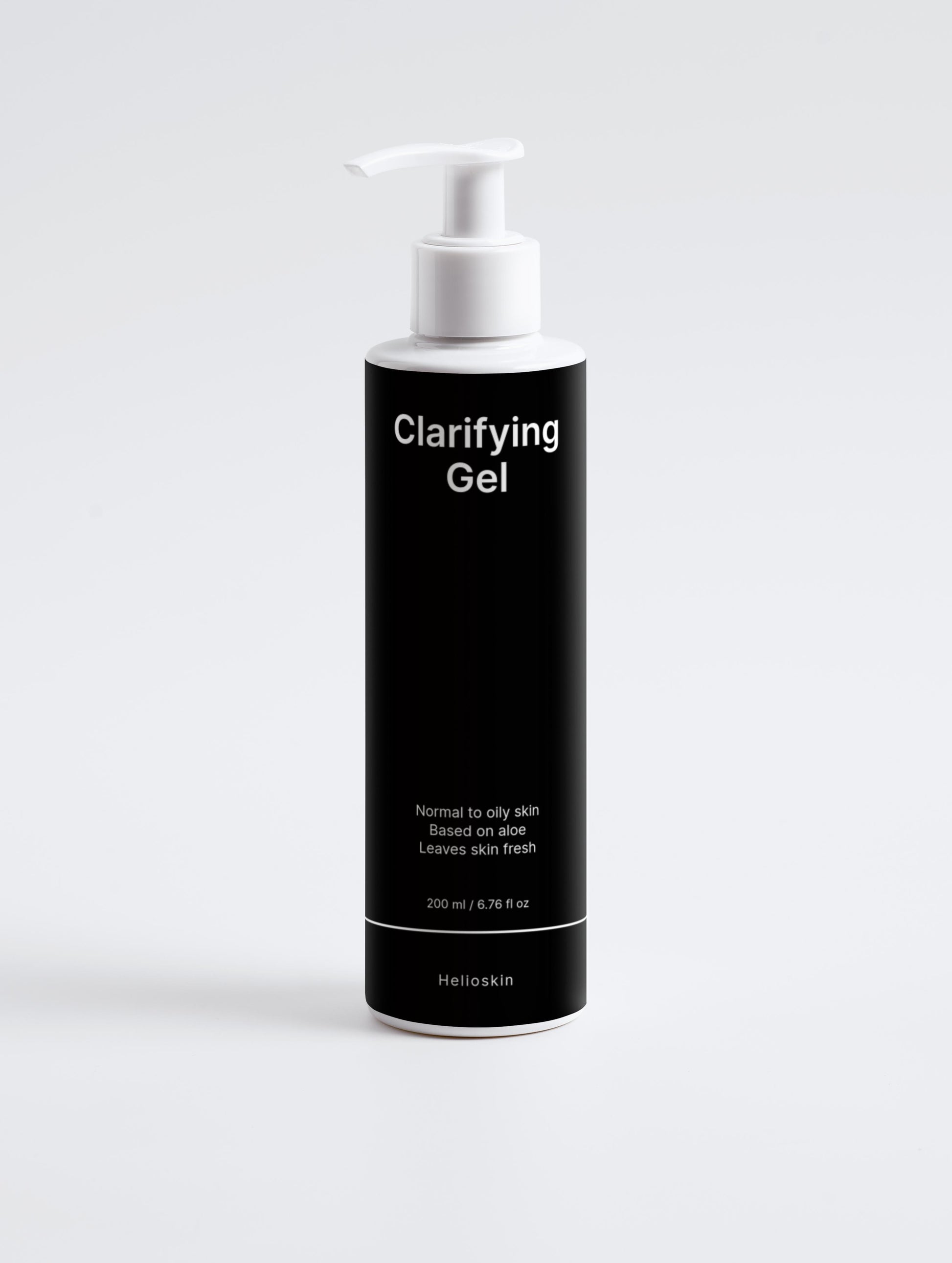 Black bottle of Clarifying Gel with white pump on a light gray background