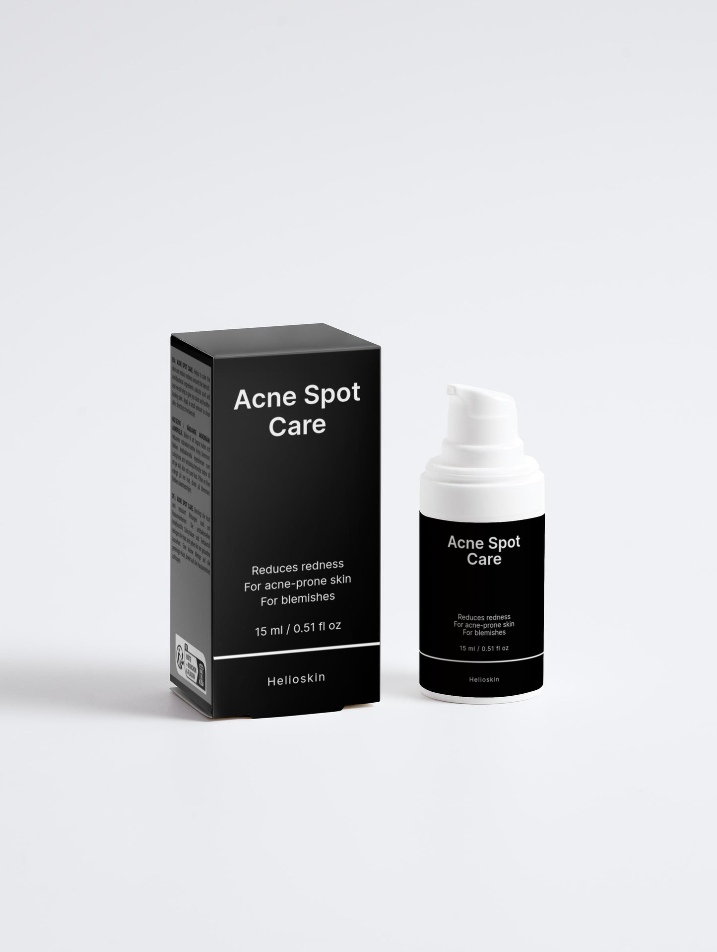 Acne Spot Care packaging and bottle on a white background