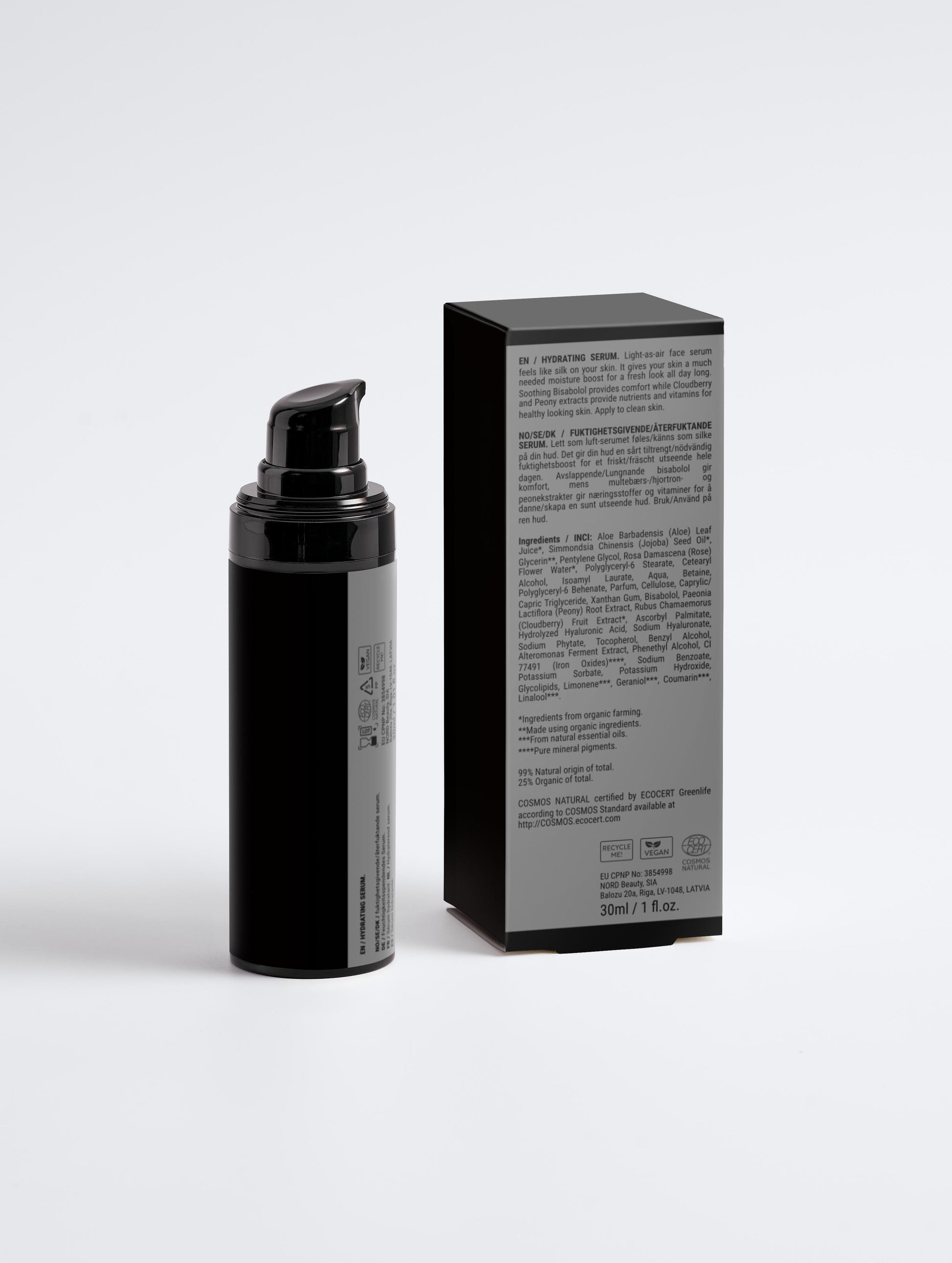 Black cosmetic bottle and packaging box on a white background