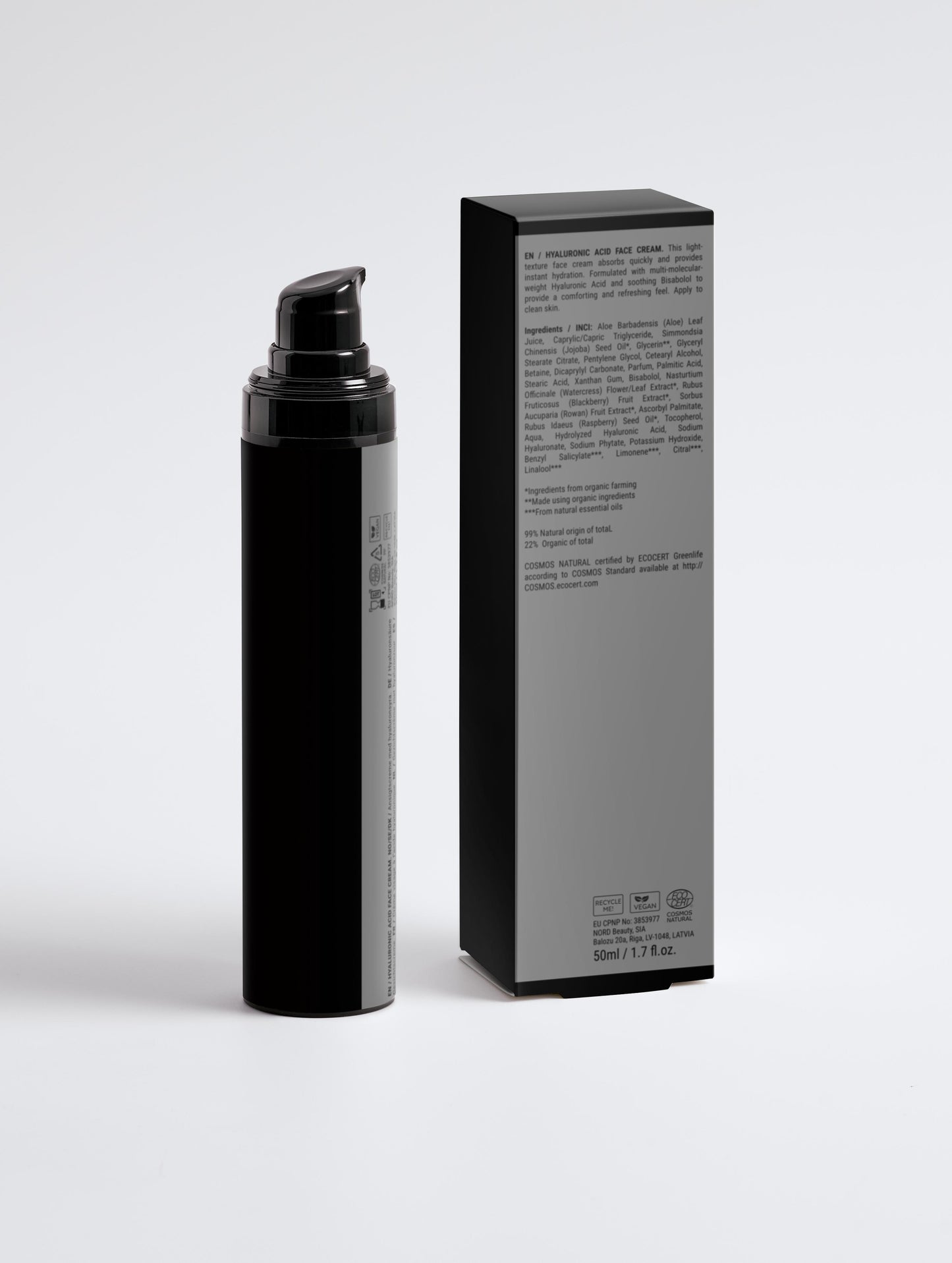 Black spray bottle and its packaging on a white background