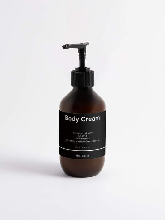 Body cream bottle with pump on a white background