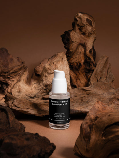 Skincare bottle with a black label on a brown background with natural wood elements