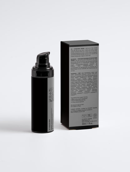 Black cosmetic bottle and packaging box on a white background