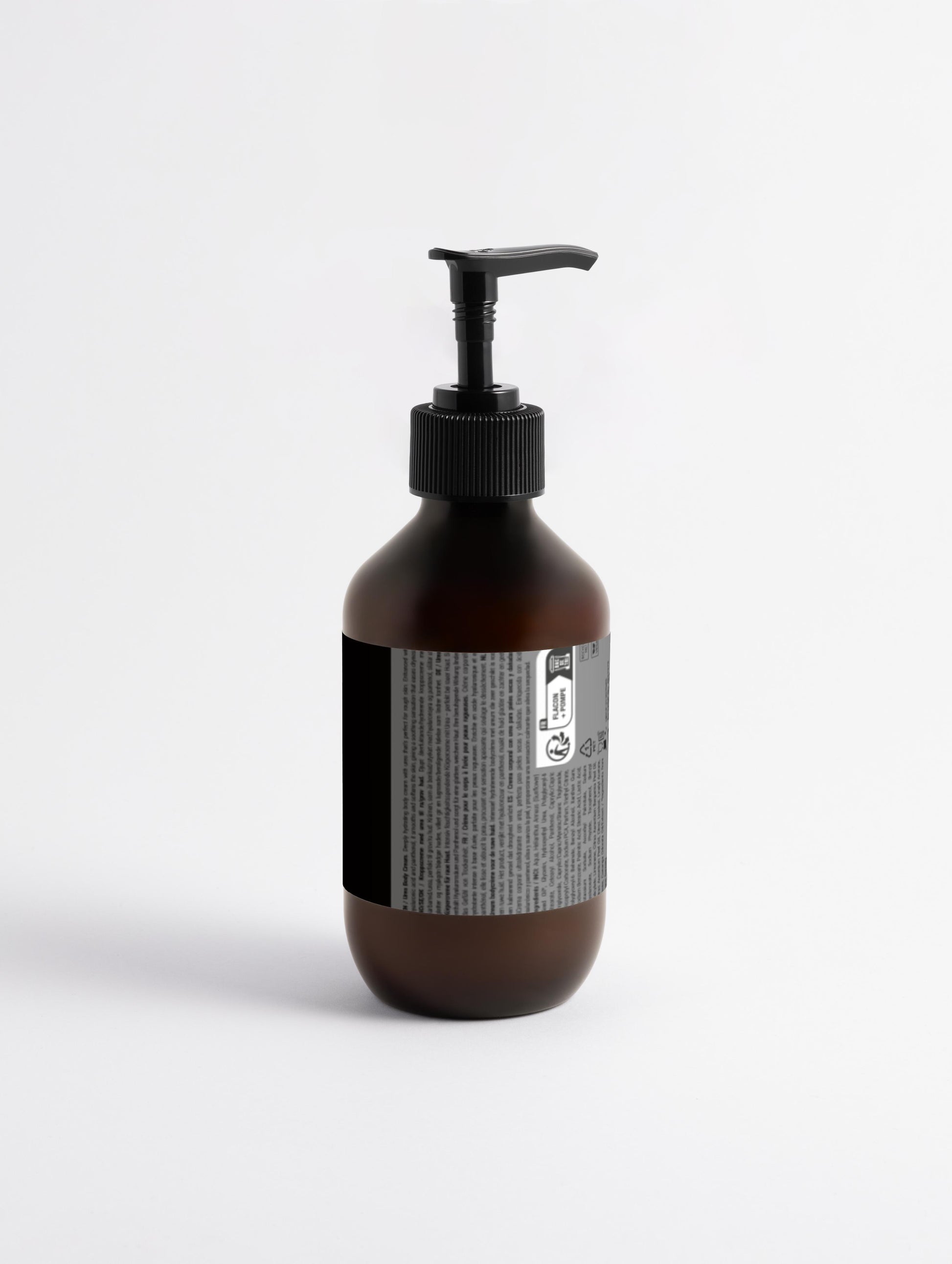 Brown bottle with pump and label on a white background